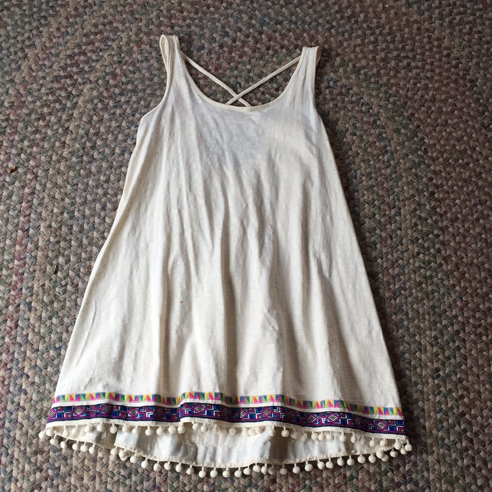 white dress Pom Pom with designs